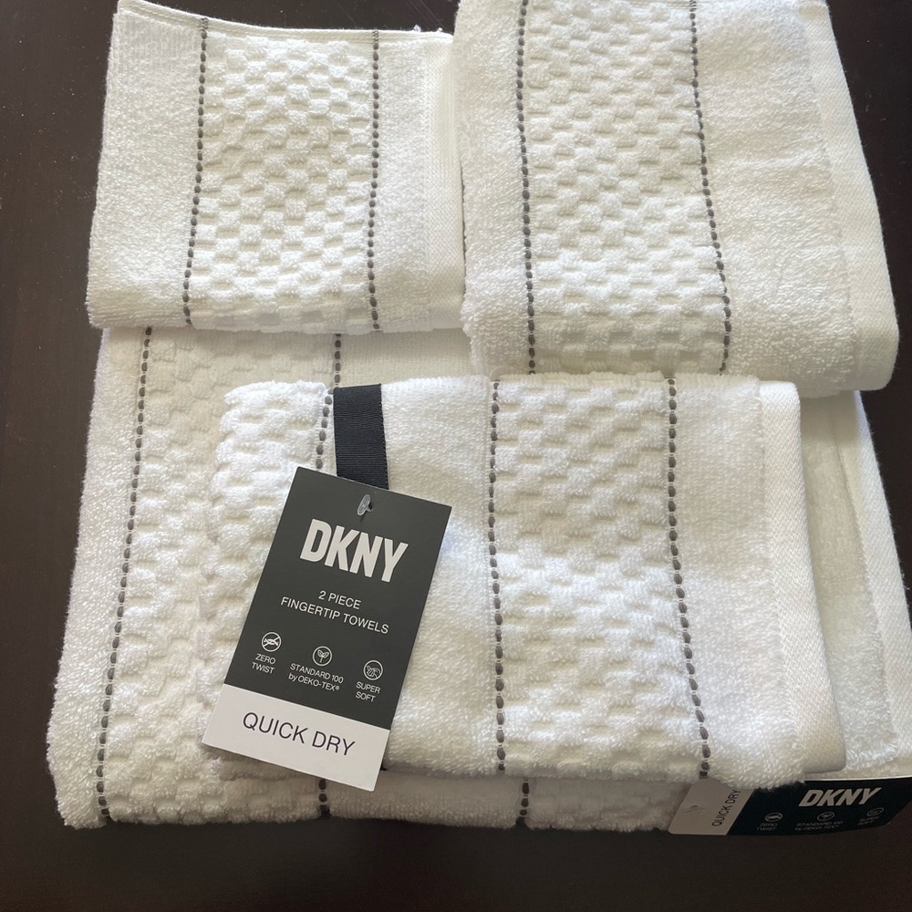 DKNY Set of Towels. One Bath, one Hand, Two fingertip and One Washcloth.